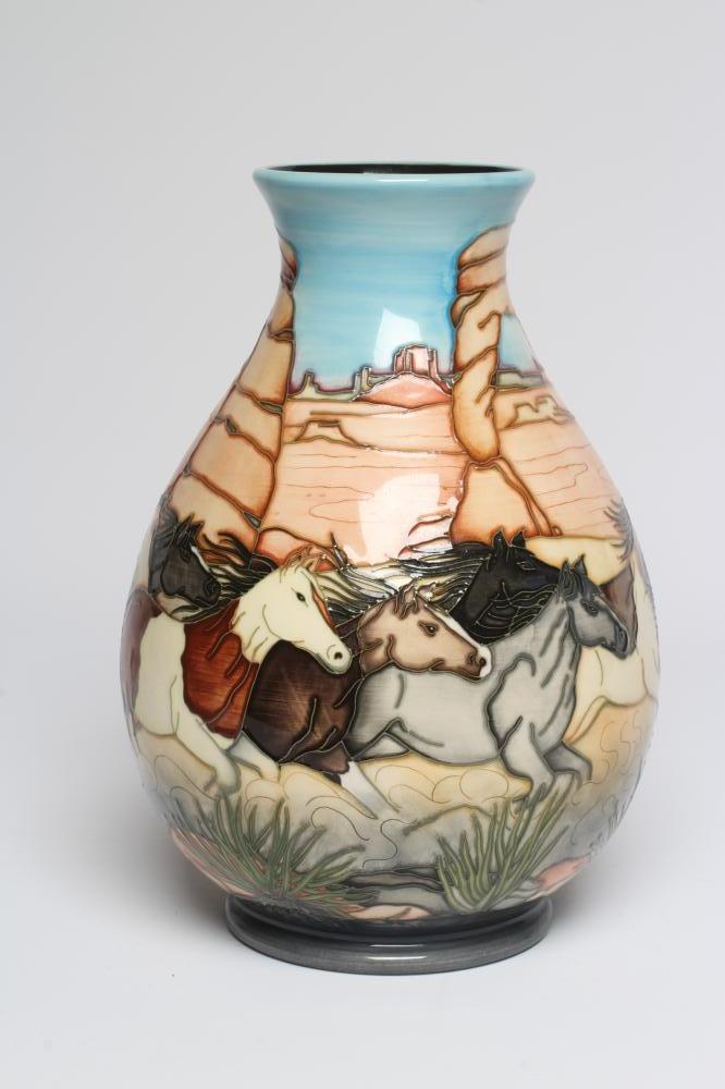 A MOORCROFT POTTERY STAMPEDE TRIAL VASE, 2005, of baluster form, painted in colours designed by Paul Image