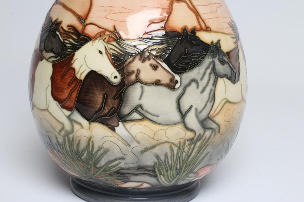 A MOORCROFT POTTERY STAMPEDE TRIAL VASE, 2005, of baluster form, painted in colours designed by Paul Image