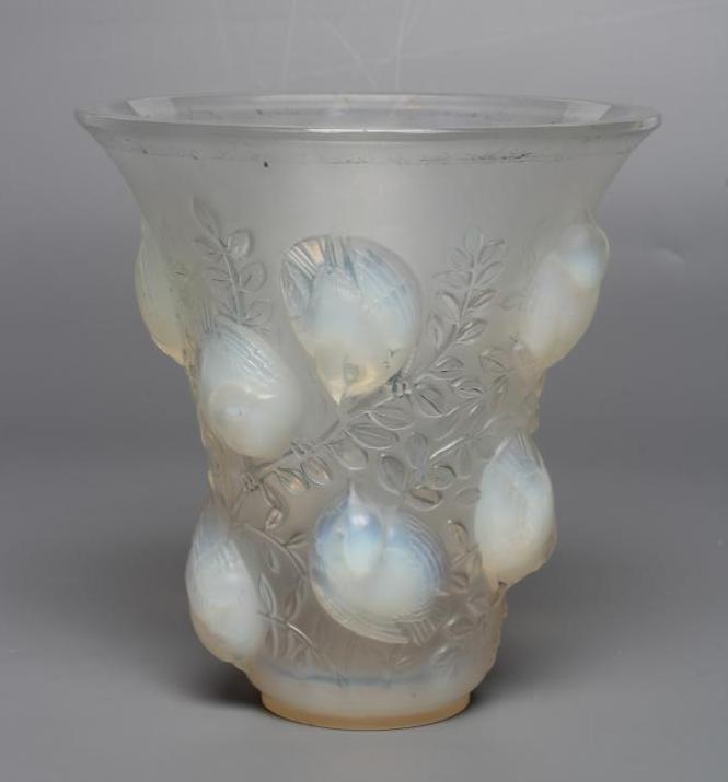 A LALIQUE BAGATELLE PATTERN VASE of flared cylindrical form, the exterior moulded in high relief Image