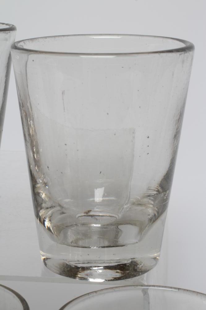 A COLLECTION OF TWENTY FIVE GEORGIAN AND LATER HEAVY GLASS TUMBLERS, various sizes and dates (Est. Image