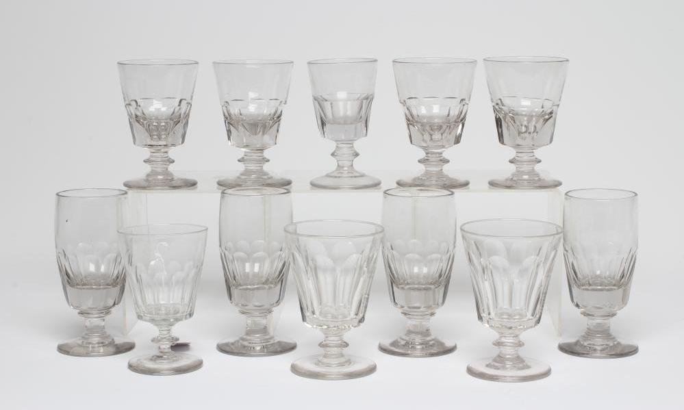 A MATCHED SET OF SEVEN GLASS RUMMERS with panel cut bucket bowls, together with a set of four other Image