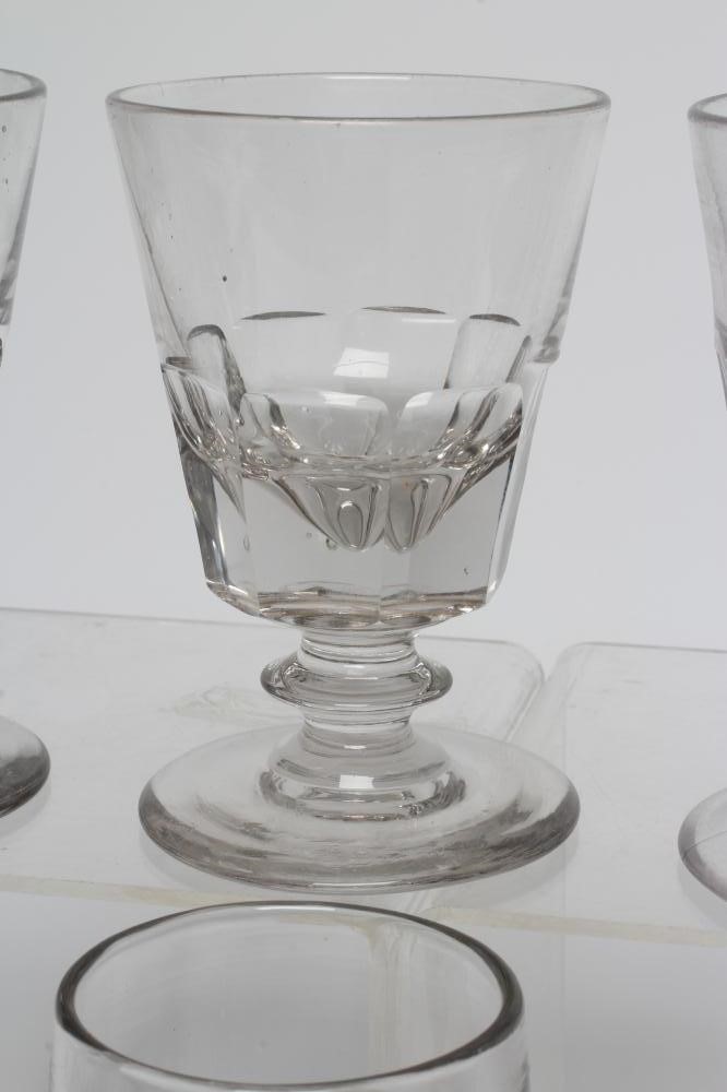A MATCHED SET OF SEVEN GLASS RUMMERS with panel cut bucket bowls, together with a set of four other Image
