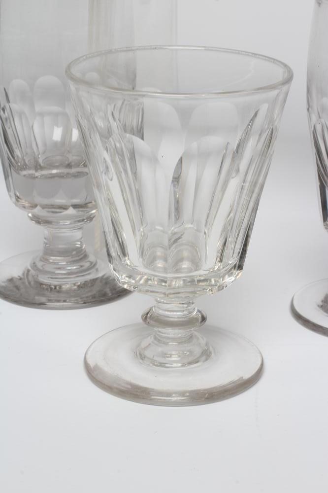 A MATCHED SET OF SEVEN GLASS RUMMERS with panel cut bucket bowls, together with a set of four other Image