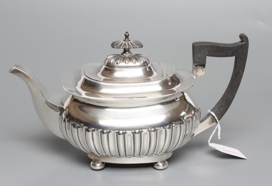 A SILVER TEAPOT Image