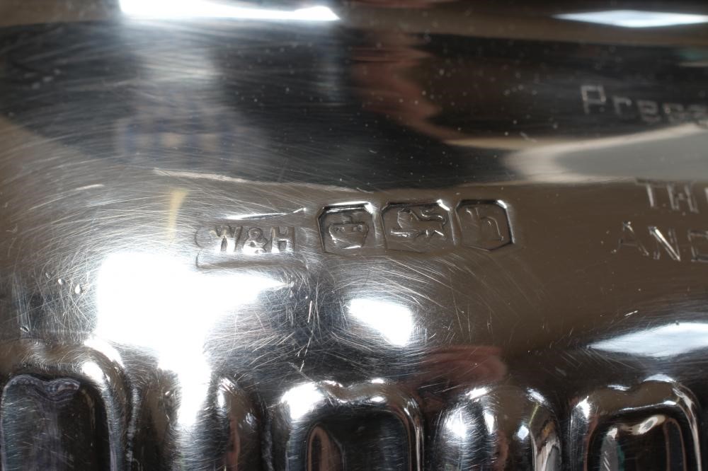 A SILVER TEAPOT Image