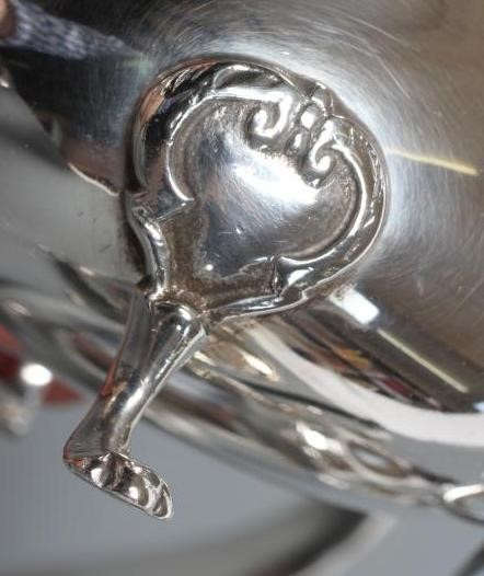 A SILVER THREE PIECE TEA SERVICE Image