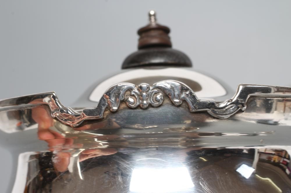A SILVER THREE PIECE TEA SERVICE Image