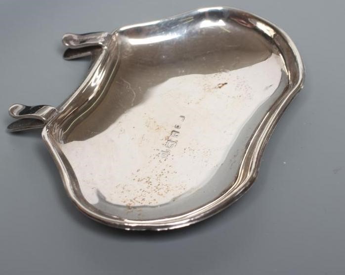 A SET OF SIX INDIVIDUAL SILVER CONDIMENT TRAYS, maker H J Cooper, Birmingham 1911, of shaped oblong Image