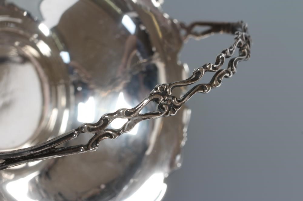 A PAIR OF SILVER EPERGNE BASKETS Image