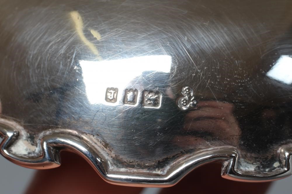 A PAIR OF SILVER EPERGNE BASKETS Image