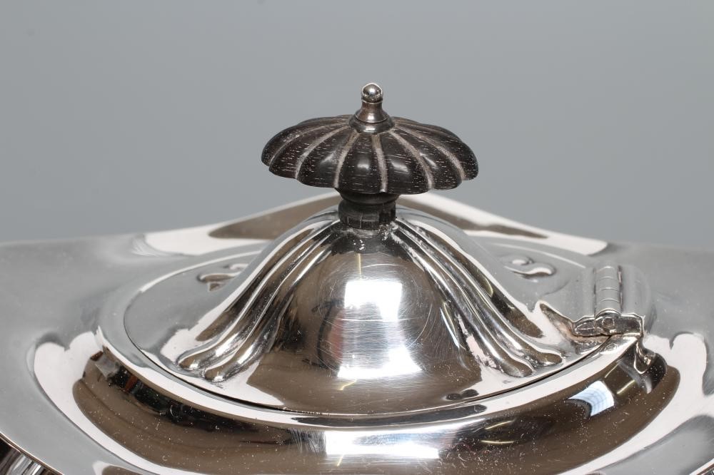 A SILVER THREE PIECE TEA SERVICE Image