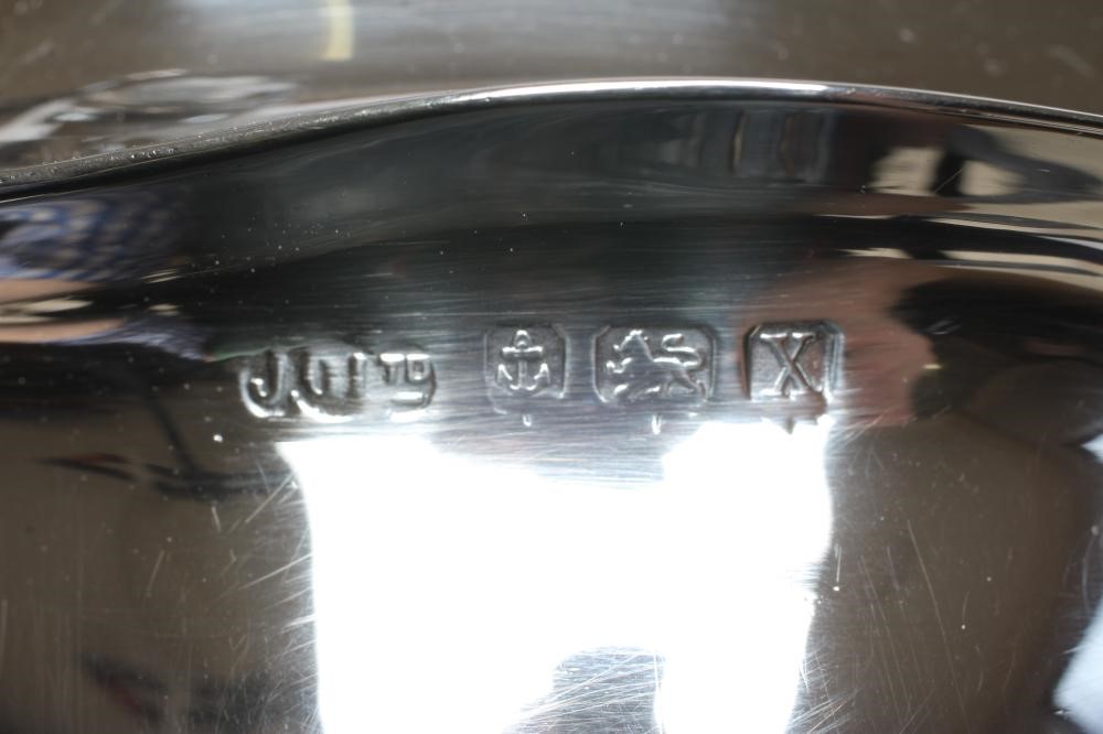 A SILVER THREE PIECE TEA SERVICE Image