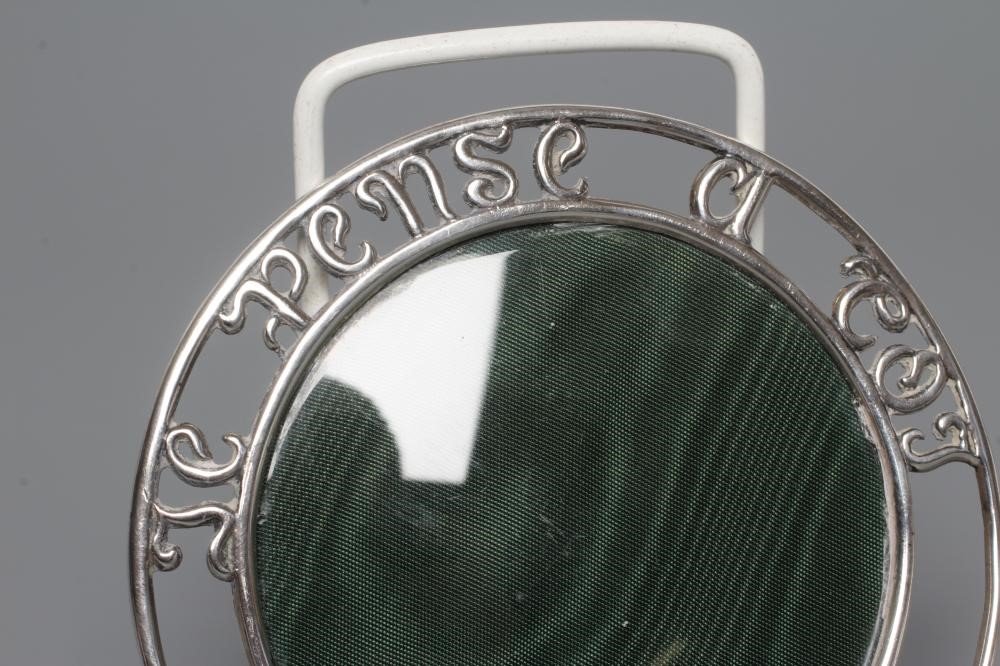 A NOVELTY CIRCULAR STRUT BACK SILVER PHOTOGRAPH FRAME Image