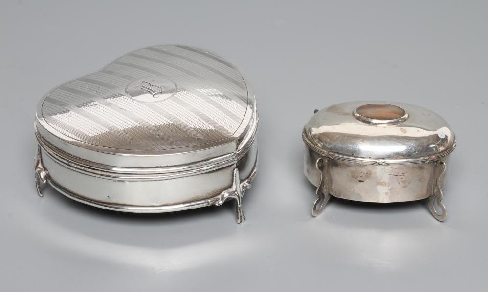 A SILVER HEART SHAPED DRESSING TABLE BOX Image