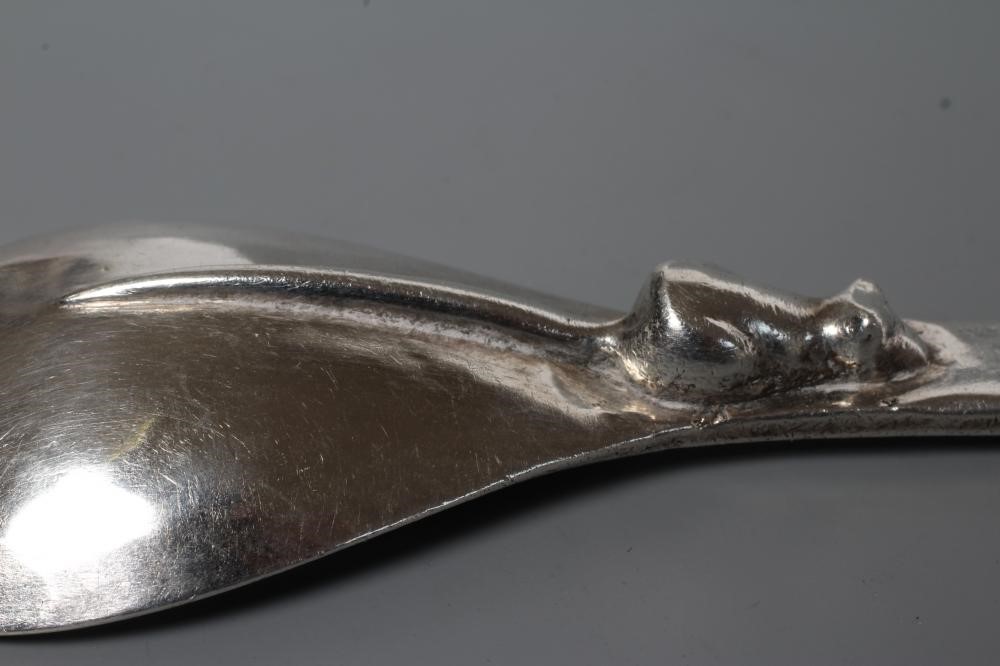 AN ARTS AND CRAFTS SILVER PRESERVE SPOON Image