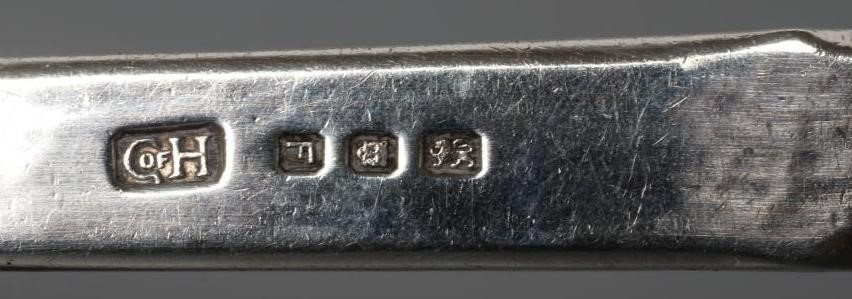 AN ARTS AND CRAFTS SILVER PRESERVE SPOON Image