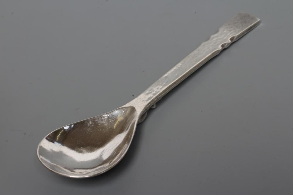 AN ARTS AND CRAFTS SILVER PRESERVE SPOON Image