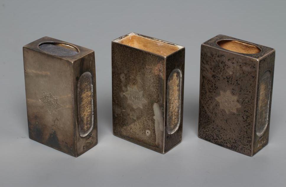 A SET OF THREE SMALL SILVER MATCH BOX CASES, maker SJ Rose, London 1935, each engraved with the Image