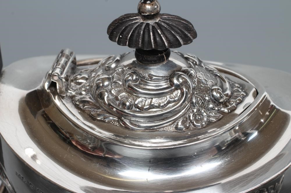 A BACHELOR'S EDWARDIAN SILVER COMPOSITE THREE PIECE TEA SERVICE Image