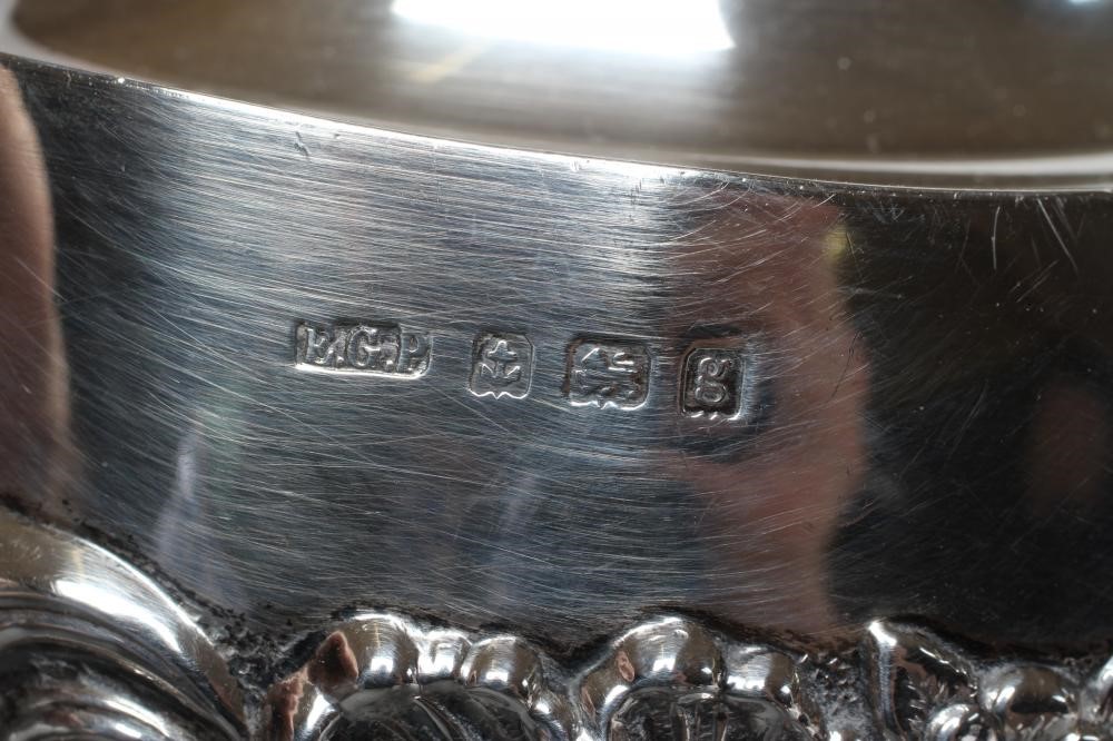 A BACHELOR'S EDWARDIAN SILVER COMPOSITE THREE PIECE TEA SERVICE Image