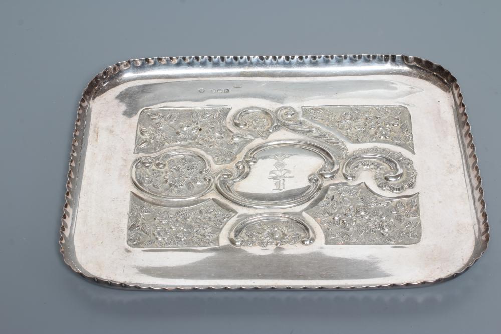 A LATE VICTORIAN SILVER DRESSING TABLE TRAY Image