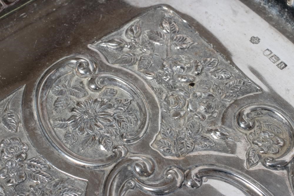 A LATE VICTORIAN SILVER DRESSING TABLE TRAY Image