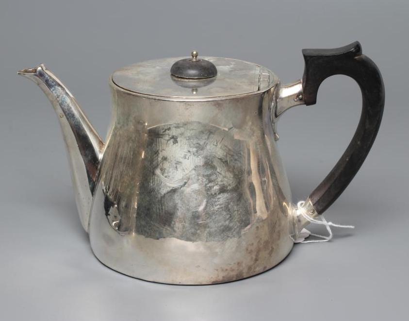 A VICTORIAN SILVER TEAPOT Image