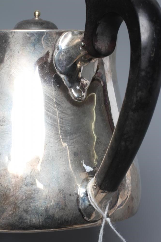 A VICTORIAN SILVER TEAPOT Image