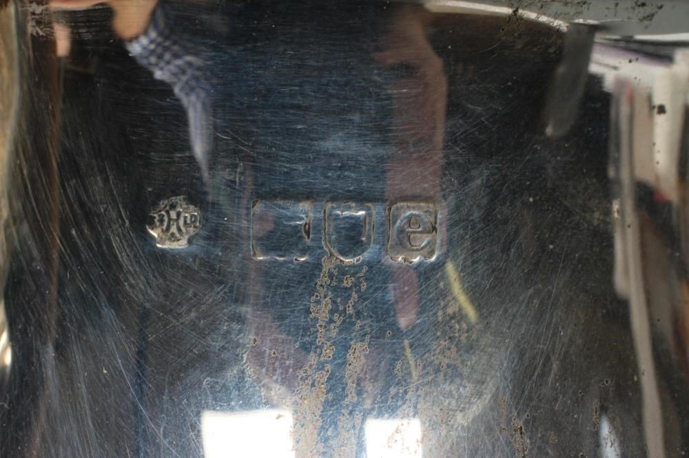 A LATE VICTORIAN SILVER HOT WATER JUG Image