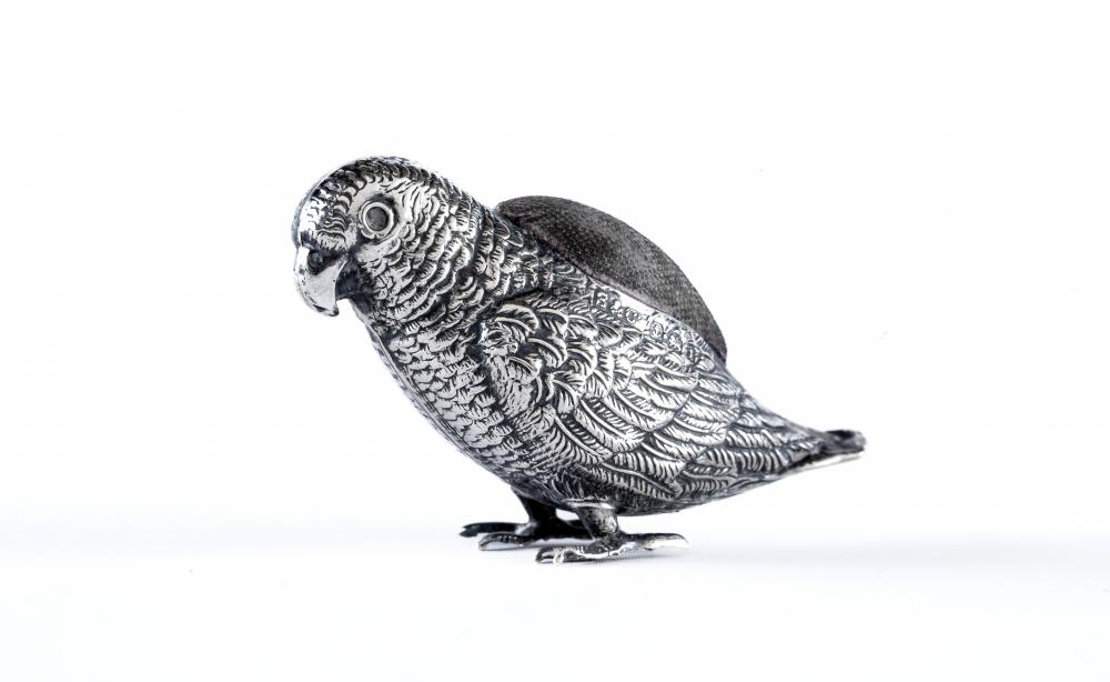 AN EDWARDIAN SILVER NOVELTY PARROT PIN CUSHION, maker Sydney & Co., Birmingham 1908, with original Image