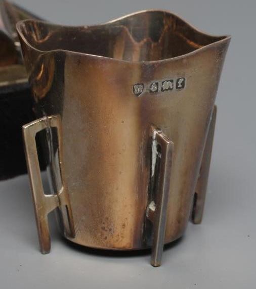 A SET OF FOUR EDWARDIAN SILVER WHISKY TOTS Image