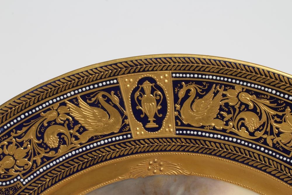 A VIENNA PORCELAIN CABINET PLATE centrally painted in polychrome enamels by Ens with 'L'eveil du Image