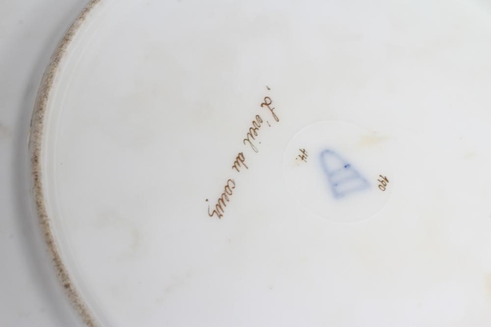 A VIENNA PORCELAIN CABINET PLATE centrally painted in polychrome enamels by Ens with 'L'eveil du Image