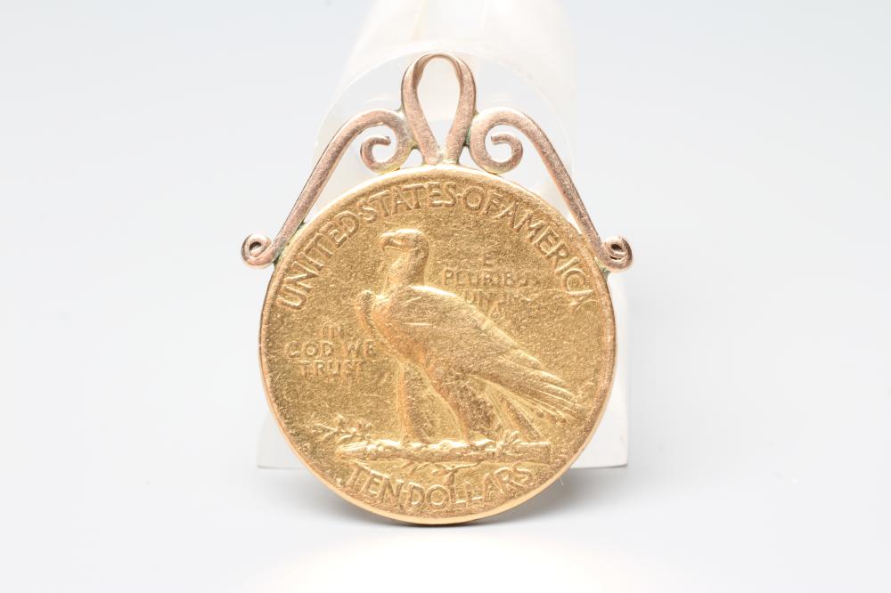 A USA GOLD $10, 1911, hard mounted as a fob, 18.1g gross (Est. plus 20% premium) Image