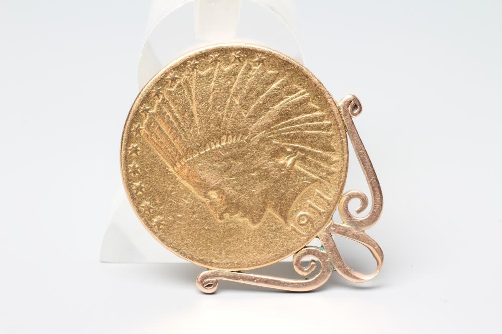 A USA GOLD $10, 1911, hard mounted as a fob, 18.1g gross (Est. plus 20% premium) Image