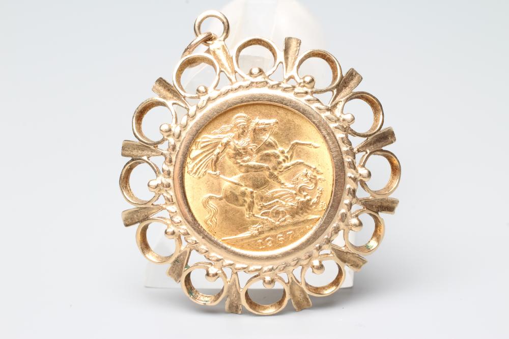 AN ELIZABETH II SOVEREIGN, 1967, in a loose 9ct gold pendant mount, London 1972, 12.8g total Image