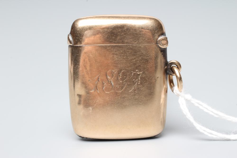A LATE VICTORIAN 9CT GOLD VESTA CASE, Chester 1896, of plain rounded oblong form, engraved with Image