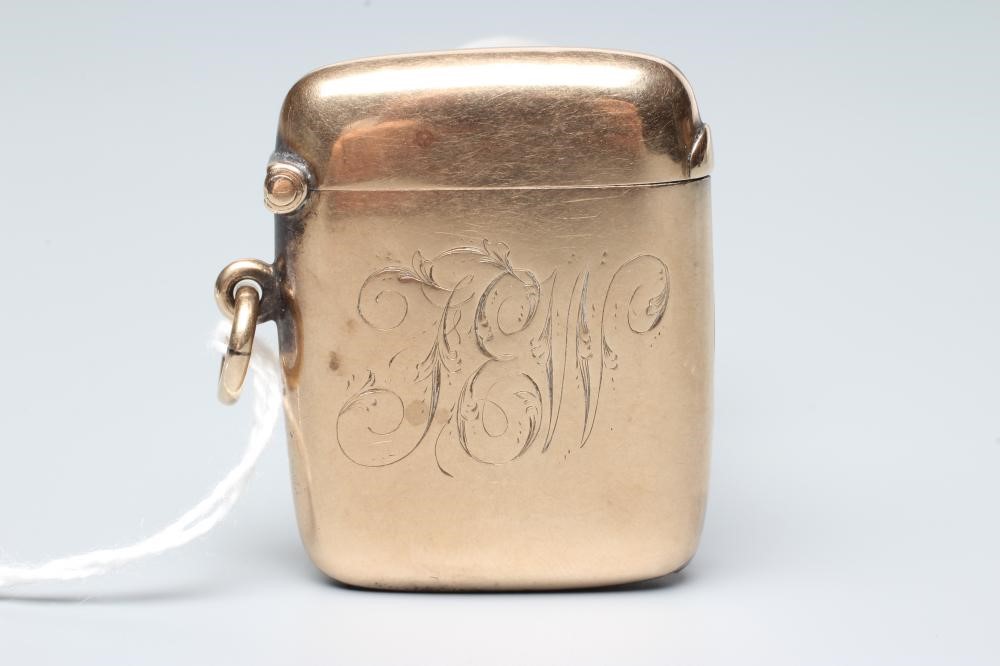 A LATE VICTORIAN 9CT GOLD VESTA CASE, Chester 1896, of plain rounded oblong form, engraved with Image