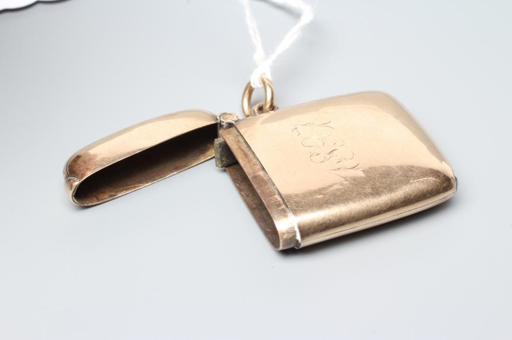 A LATE VICTORIAN 9CT GOLD VESTA CASE, Chester 1896, of plain rounded oblong form, engraved with Image