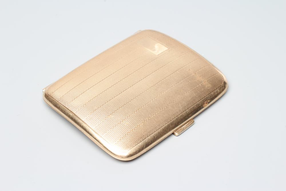 A 9CT GOLD CIGARETTE CASE of plain slightly concave rounded oblong form Image