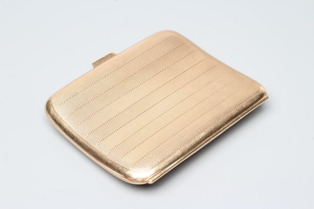 A 9CT GOLD CIGARETTE CASE of plain slightly concave rounded oblong form Image