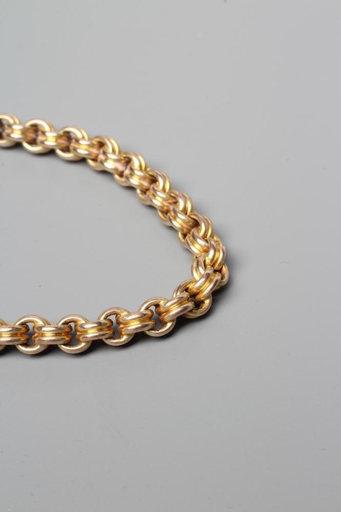 A REEDED FANCY LINK CHAIN NECKLACE, the cylinder clasp stamped 9ct (Est. plus 24% premium inc. VAT) Image