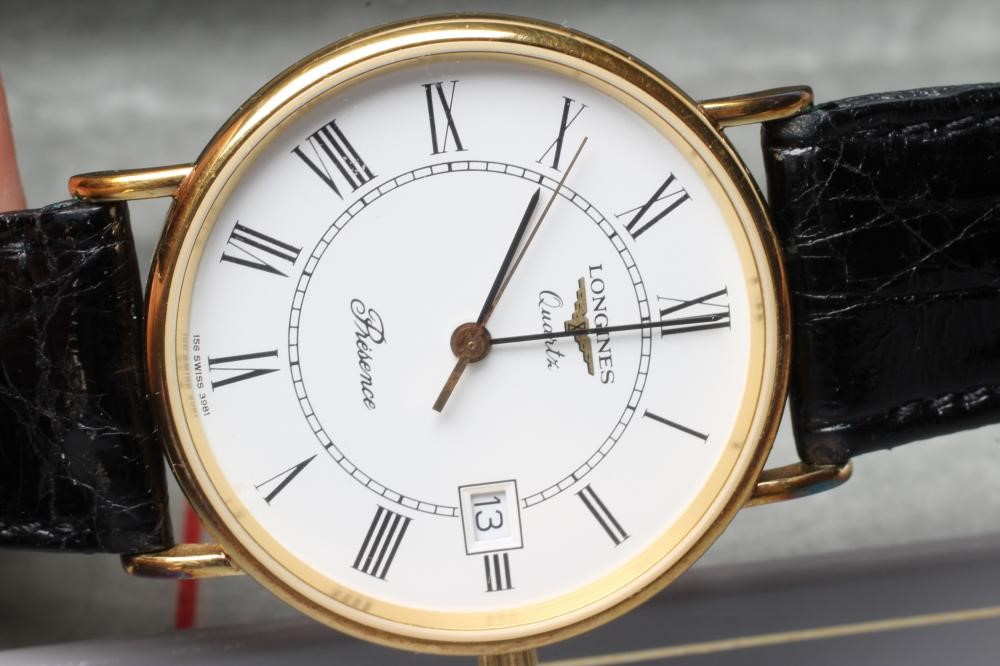A GENTLEMAN'S 9CT GOLD LONGINES PRESENCE WRISTWATCH Image