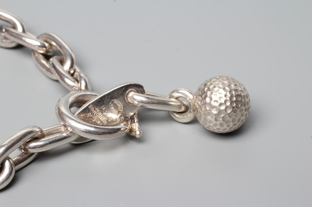 A GEORG JENSEN SILVER BRACELET, the thick links with golf ball fastener, London import 1991 (Est. Image
