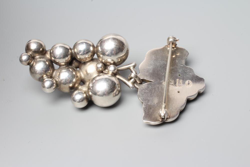 A GEORG JENSEN SILVER MOONLIGHT GRAPES BROOCH designed by Harald Nielsen, stamped and numbered 217 Image