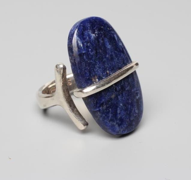 A GEORG JENSEN SILVER DRESS RING designed by Viviana Torun Bulow-Hube with a polished hardstone Image