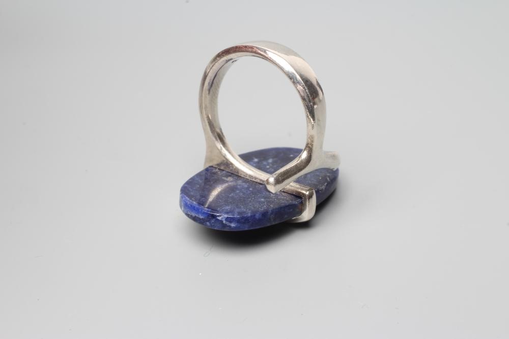 A GEORG JENSEN SILVER DRESS RING designed by Viviana Torun Bulow-Hube with a polished hardstone Image