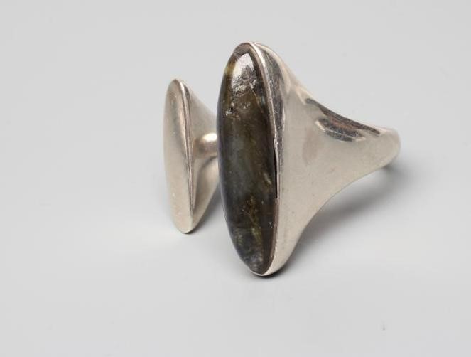 A GEORG JENSEN SILVER DRESS RING designed by Bent Gabrielsen with a polished Labradorite, stamped Image