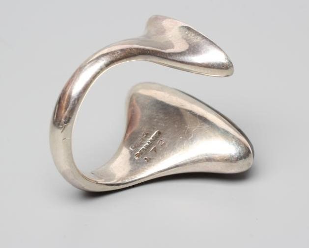 A GEORG JENSEN SILVER DRESS RING designed by Bent Gabrielsen with a polished Labradorite, stamped Image