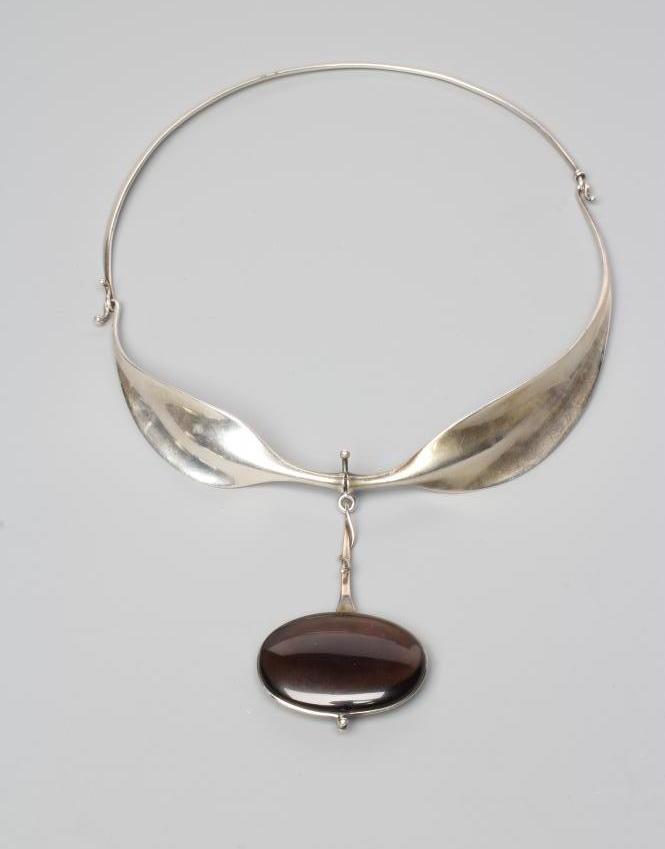 A GEORG JENSEN SILVER NECK RING designed by Viviana Torun Bulow-Hube Image